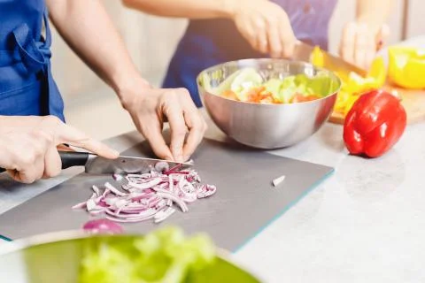 Woman hands cutting vegetables cooking ingredients. Concept healthy eating Stock Photos