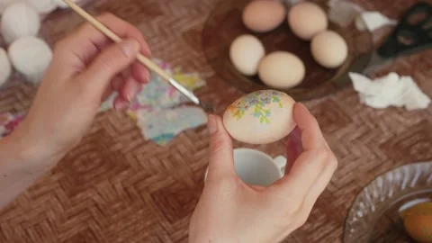 Woman hands decorating Easter eggs Stock Footage 171654235