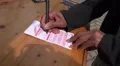 Woman hands filling the pools coupon for Horse Racing HD Footage