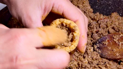 Woman hands making and preparing middle eastern traditional food Stock Footage 250457053