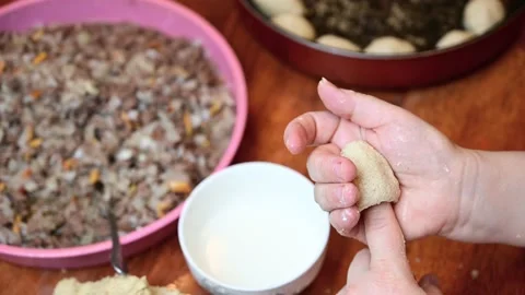 Woman hands preparing middle eastern food Kibbah Stock Footage 134336624