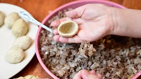 Woman hands preparing middle eastern food Kibbah Stock Footage 134336799