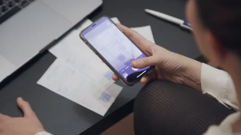 Woman hands scanning qr code of a check with smart phone Stock Footage 119472878