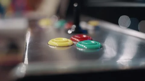 Woman hands skillfully using a joystick and colorful arcade buttons playing o Stock Footage 296357119