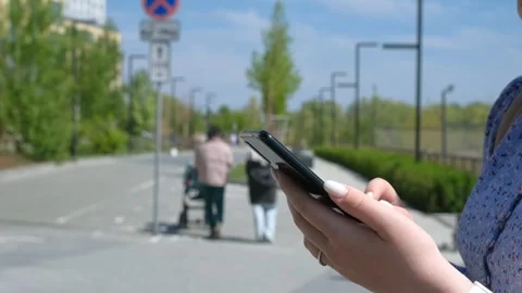 Woman hands texting, using smartphone. Female hands using smartphone while Stock Footage 247784837