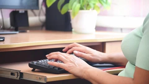Woman hands typing computer keyboard, office worker . Distance work at home. 4k Stock Footage 249998826