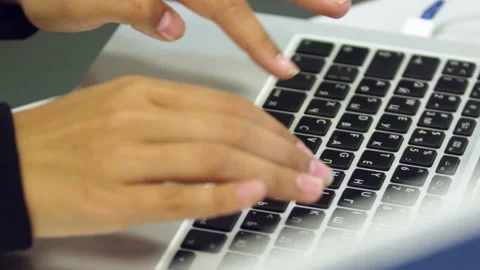 Woman hands typing text on keyboard of computer closeup Stock Footage 234322345