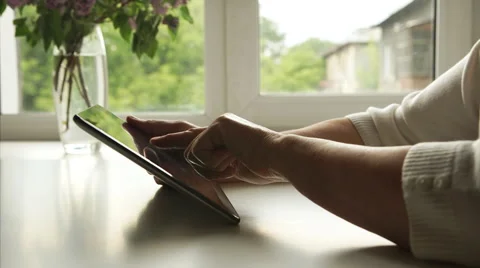Woman Hands using a digital tablet PC at home Stock Footage 50593669