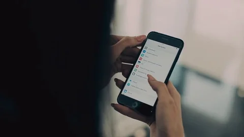 Woman hands using mobile in window background. smartphone in female hands Vidéo 71822419