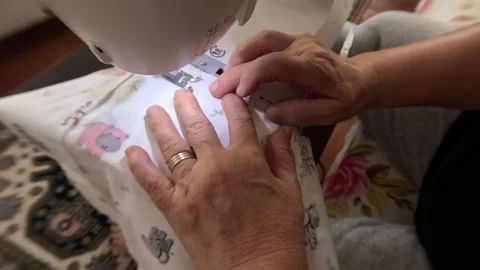 Woman Hands Using Old Sewing Close Up Machine 動画素材 339977602
