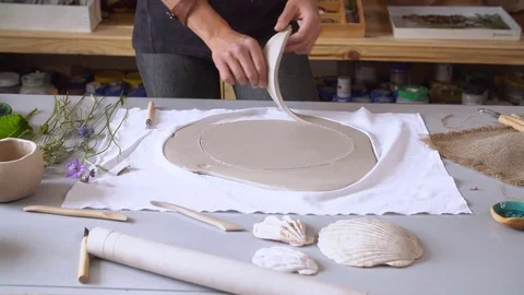 Woman hands using rolling pin, ceramic dish Stock Footage 77207129