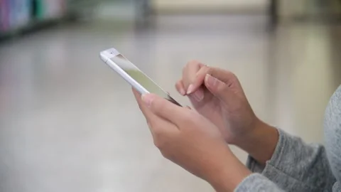 Woman hands using smartphone digital technology tablet Stockbeeldmateriaal 266860605