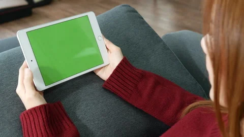 Woman hands using smartphone digital tablet empty blank green screen. Close up H Stock Footage 276676689