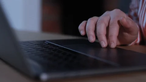 Woman hands using touchpad and typing on keyboard laptop close-up Stock Footage 105615401