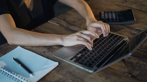 Woman hands using touchpad and typing on laptop Video stock 115215474