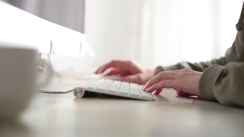 Woman hands work at the computer on the keyboard and control the mouse. Stock Footage 99980993