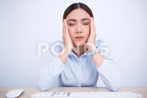 Woman Has Head Pain From Work