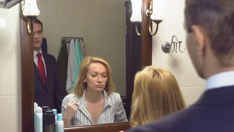 Woman has problems with clothes in the bathroom. Stock Footage 95748768