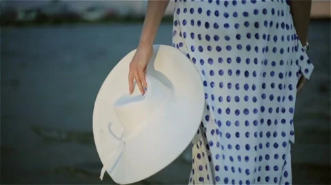 A woman with a hat. Slow motion. Stock Footage 65501600
