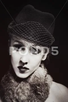 Woman in hat with veil Stock Photos
