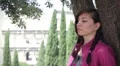 A woman have a argument with her boyfriend, he brings her a rose to make peace HD Footage
