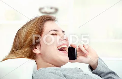 Woman have joyful talk over phone Stock Photos