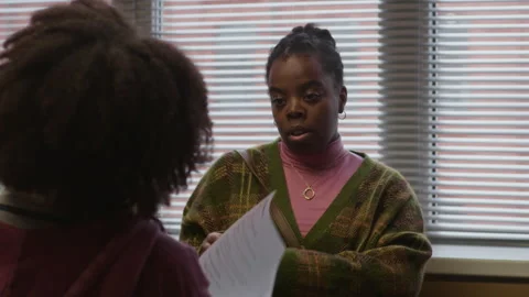 Woman Having Conversation about Failed Test with Daughter in School Office Stock Footage 322576603