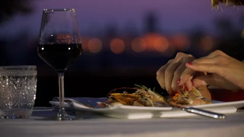 Woman having dinner at sunset 스톡 동영상 128015309