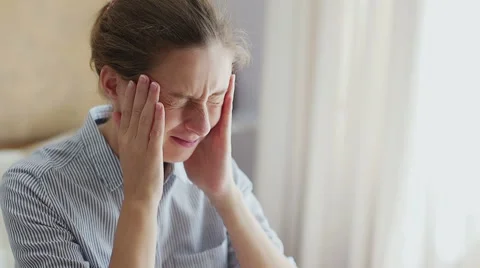 Woman having headache Stock Footage 66455785