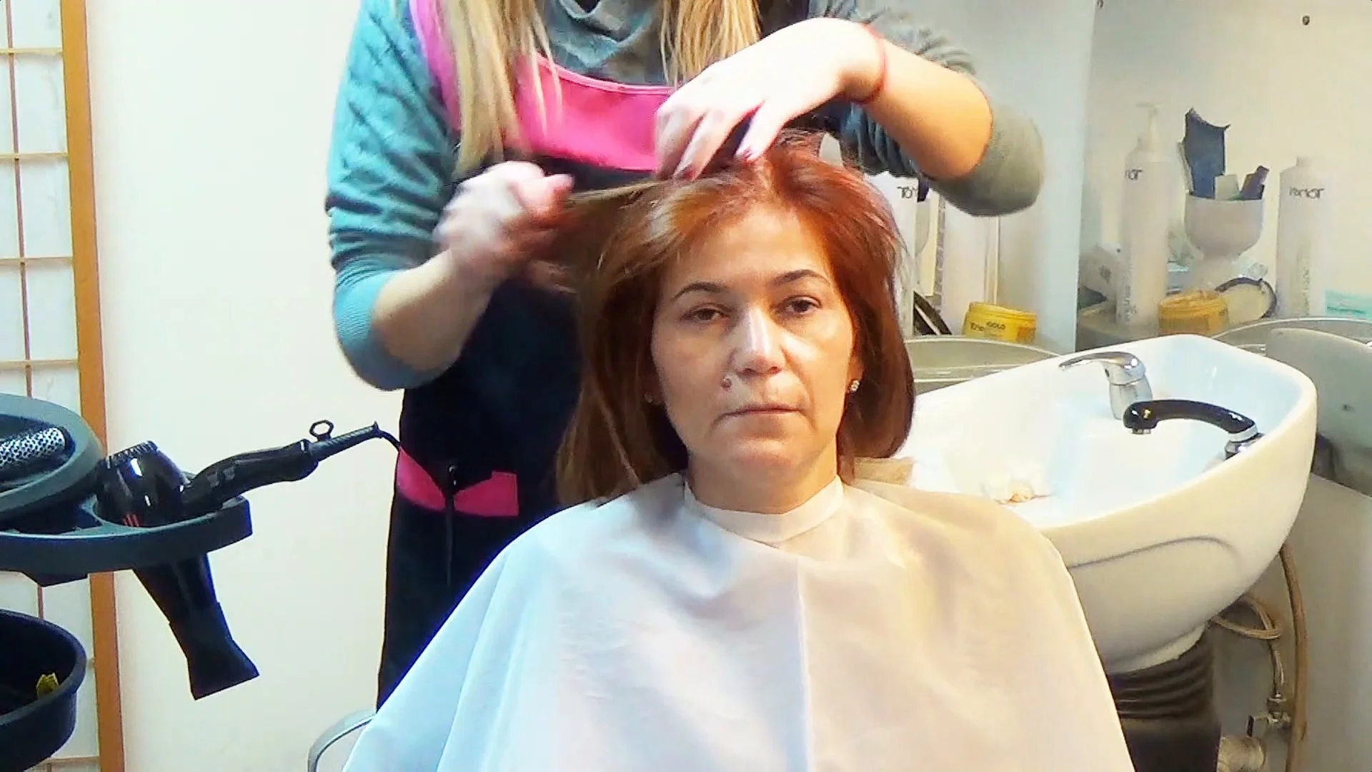 Video Woman Having Her New Style Finished At The Hairdresser