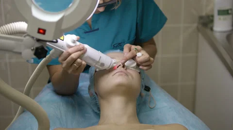 Woman having a laser skin treatment Stock Footage