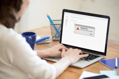 Woman having problem with computer, application failed, operatio Stock Photos
