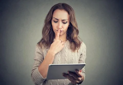 Woman having problems with tablet Stock Photos