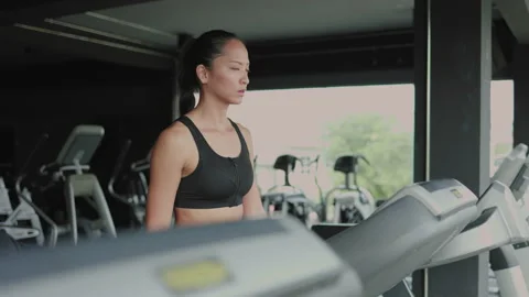 Woman having workout on treadmill at Stock Video Pond5 - Main Image
