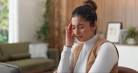 Woman, headache and remote work in home with laptop, fatigue and challenge for Stock Footage 337289643