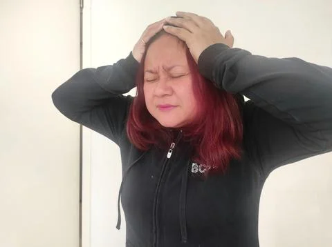 Woman in Headache expression. Stock Photos