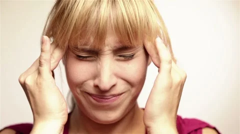 Woman with headache Stock-Footage 7903969