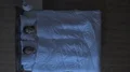 The woman with a headache lay on the bed. night time. view from above 4k or 4k+ Resolution
