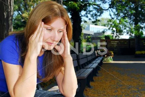 Woman with headache Stock Photos