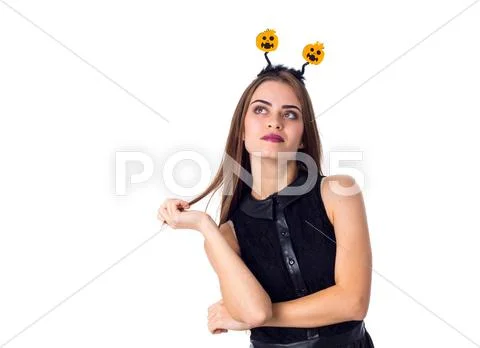 Woman with headband looking up Stock Photos