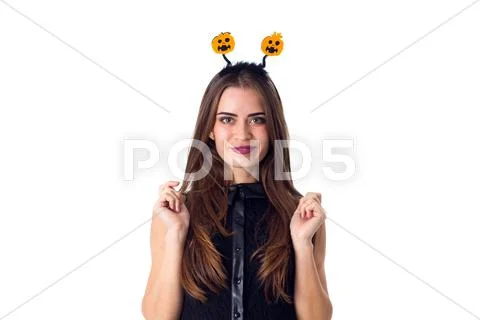 Woman with headband touching her hair Stock Photos