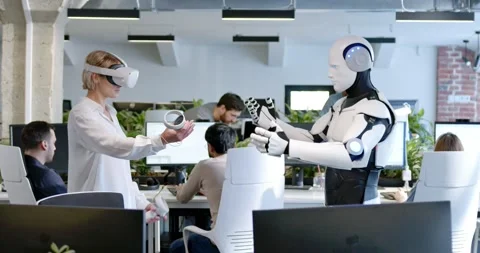 Woman in headset programming robot with metaverse tools. Developer in VR Stock Footage 180036567