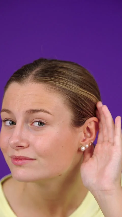 Woman with hearing problems hand on ear Vídeos de archivo 253164558