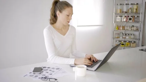 Woman in her 30s inside a modern condominium in downtown toronto (canada) Stock Footage
