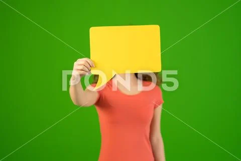 The woman hide her face by dialog sign on the green background Stock Photos
