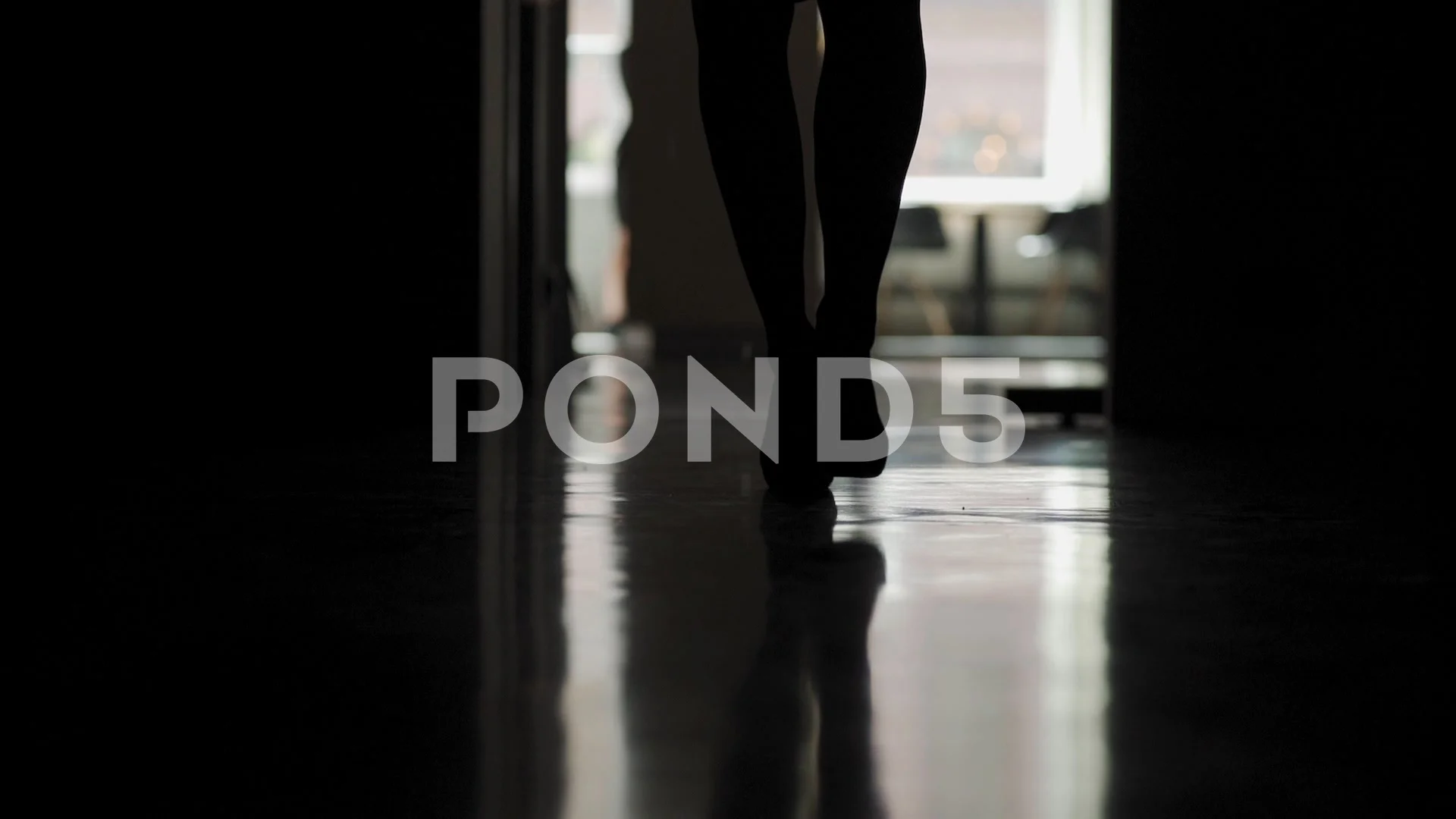 Woman in high heels walking down corrido, Stock Video