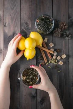 Woman hold in hands glass cup tea Stock Photos