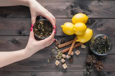 Woman hold in hands glass cup tea Stock-Fotos