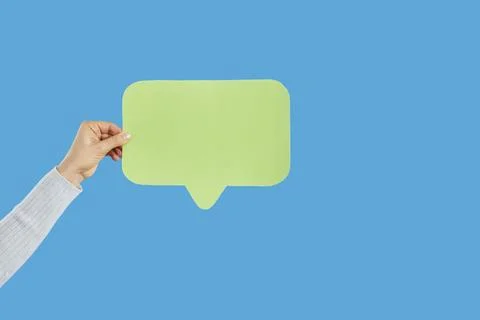 Woman hold speech bubble with empty copy space 写真素材