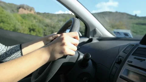 Woman hold steering wheel while driving car,Safety drive transportation Stock Footage 201743271